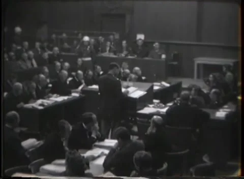 NUREMBERG - 1946: High-angle wide over the courtroom well Stock Footage 342921012