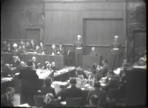NUREMBERG - 1946: High wide over the court's working tables Stock Footage 342920861