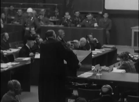 NUREMBERG - 1946: IMT proceedings — Field glasses above the lectern 库存影片 343542247