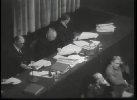 NUREMBERG - 1946: Long raised bench heaped with folders Stock Footage 342921111