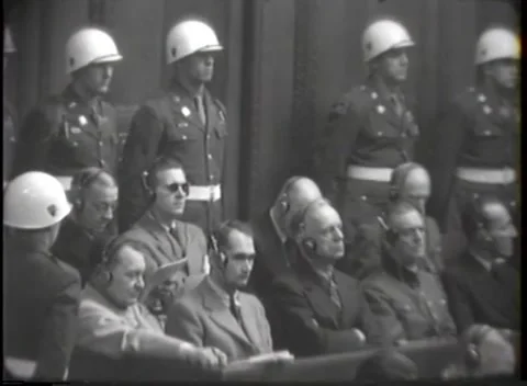 NUREMBERG - 1946: Men in the dock at the war crimes trial Stock Footage 342920870