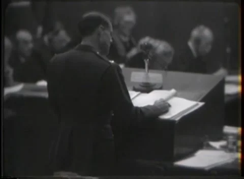 NUREMBERG - 1946: Open papers and microphone at the stand 動画素材 342921007