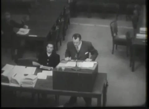 NUREMBERG - 1946: Open volume held at the counsel table Stockbeeldmateriaal 342921105