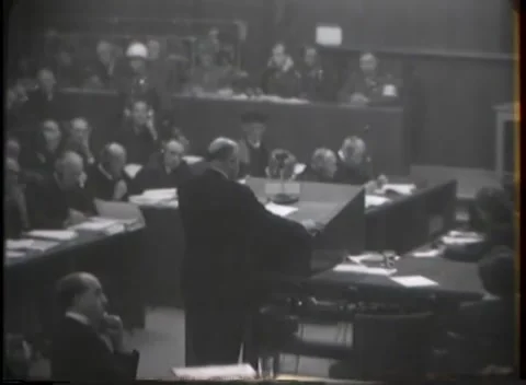 NUREMBERG - 1946: Over a lectern toward the tribunal bench 動画素材 342921060
