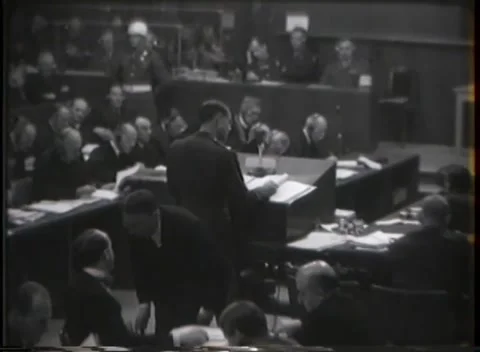 NUREMBERG - 1946: Robed figures at the tribunal bench Stock Footage 342920998