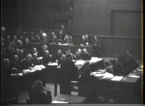NUREMBERG - 1946: War crimes hearing — High angle over central lectern 库存影片 343320803