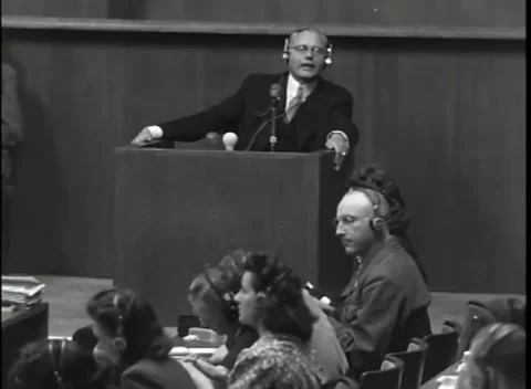 NUREMBERG - 1946: War Crimes Trials — Gisevius testifies at the box Video stock 342818802