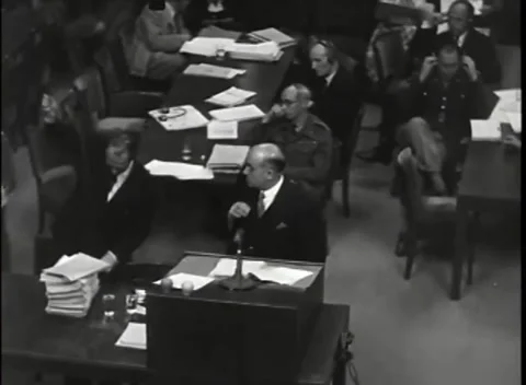 NUREMBERG - 1946: War Crimes Trials — Elevated view of the speaking desk Видео 342819280
