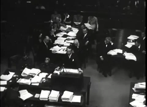 NUREMBERG - 1946: War Crimes Trials — Full courtroom during the address Stock Footage 342919357