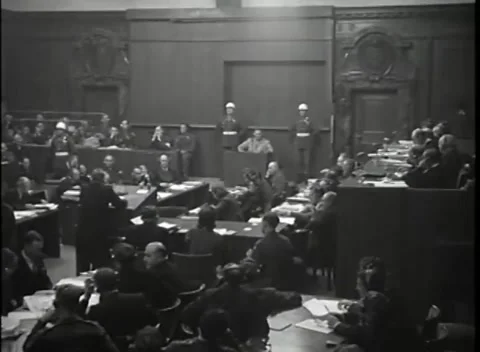 NUREMBERG - 1946: War Crimes Trials — Raised arms at the witness box Stock Footage 342919705