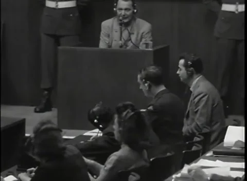 NUREMBERG - 1946: War Crimes Trials — Over the desks to Hermann Göring at the Stock Footage 342919763