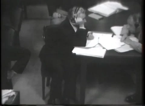 NUREMBERG - 1946: War Crimes Trials — High-angle view of counsel table in low 库存影片 342919962