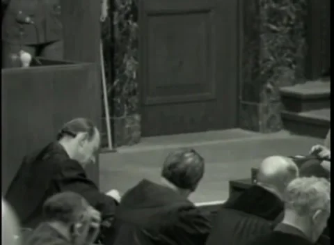 NUREMBERG - 1946: War Crimes Trials — Lower angle across the well of the court Stock Footage 342920080