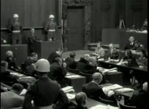 NUREMBERG - 1946: War Crimes Trials — High wide of the courtroom in session 库存影片 342920103
