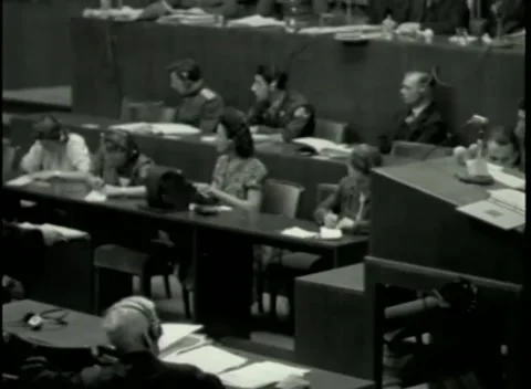 NUREMBERG - 1946: War Crimes Trials — The press and audience benches Stock Footage 342920143