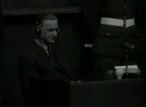 NUREMBERG - 1946: War Crimes Trials — Low-key close shot at the stand Stock Footage 342920243