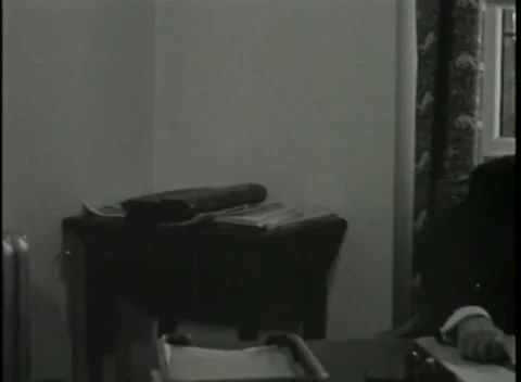 NUREMBERG - 1946: War Crimes Trials — Robert H. Jackson and an Army officer 库存影片 342920255