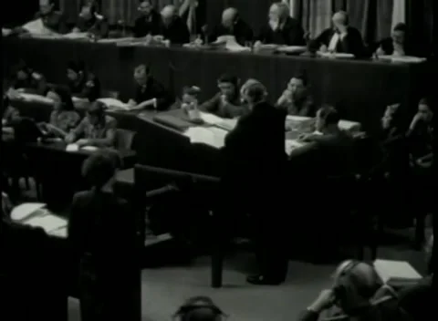 NUREMBERG - 1946: War Crimes Trials — Courtroom wide from a side vantage Видео 342920268