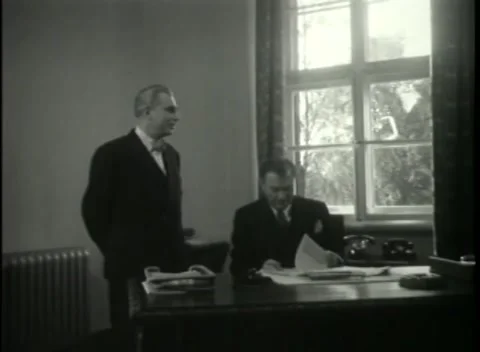 NUREMBERG - 1946: War Crimes Trials — Robert H. Jackson in a desk conference Video stock 342920286