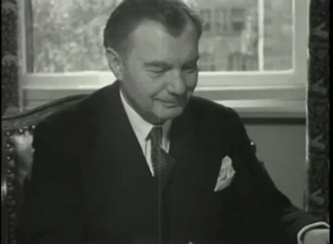 NUREMBERG - 1946: War Crimes Trials — Robert H. Jackson by a tall office window Stock Footage 342920306