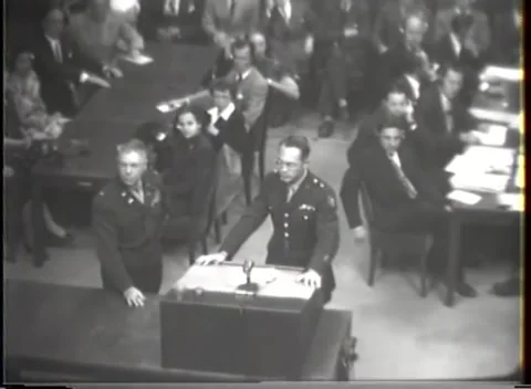 NUREMBERG - 1947: I.G. Farben case — Headphone cords across court tables 库存影片 343320900