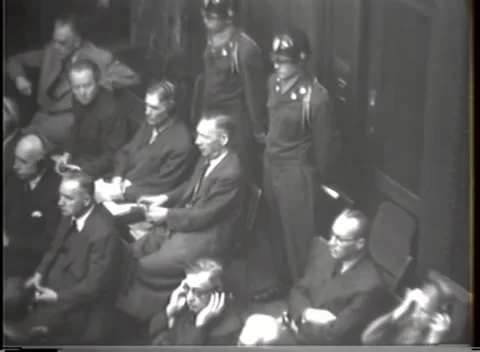 NUREMBERG - 1947: I.G. Farben case — White helmets above the dock Stockbeeldmateriaal 343320905