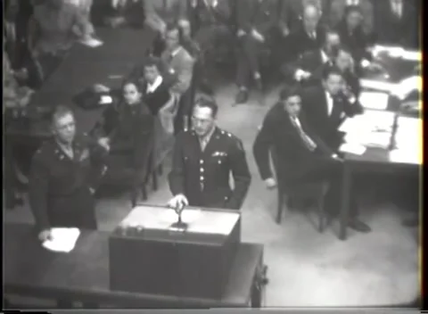 NUREMBERG - 1947: I.G. Farben case — Pale uniform behind the speaker Stockbeeldmateriaal 343320908
