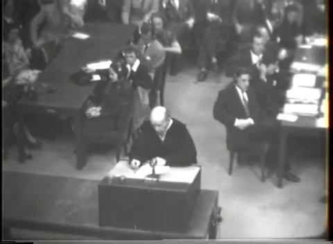 NUREMBERG - 1947: I.G. Farben case — Wide sleeves over lectern papers Video stock 343320919