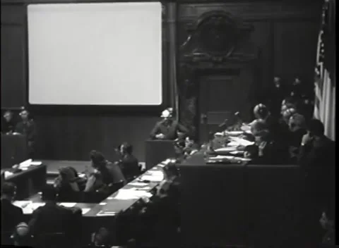 NUREMBERG, GERMANY - 1945: Star-canton flag - Elevated court surrounds speaker Stock Footage 344901925
