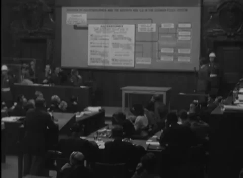 NUREMBERG, GERMANY - 1946: Bare table - Hand gesture punctuates a wide view Stock Footage 344491127