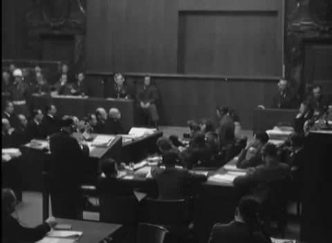 NUREMBERG, GERMANY - 1946: Dock security - Speaker faces bench from reading desk Stock Footage 344489306