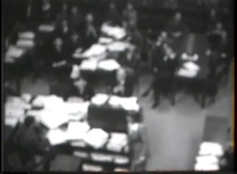 NUREMBERG, GERMANY - 1946: Document archive - Files cover courtroom desks Stock-Footage 343848375