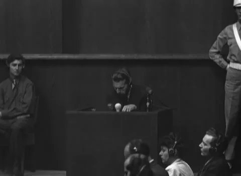 NUREMBERG, GERMANY - 1946: Microphone station - Box above headset wearers Stock Footage 343848245