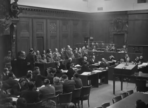 NUREMBERG, GERMANY - 1946: Pause - Entire dock remains seated under guard Видео 344490155