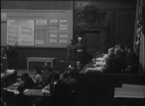 NUREMBERG, GERMANY - 1946: Striped flag - Wall displays dominate a reverse view Stock-Footage 344491142