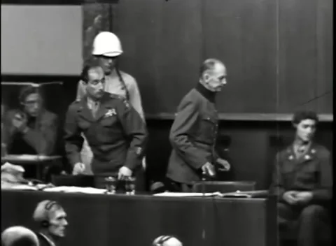 NUREMBERG, GERMANY - 1946: War Crimes Trials — Crossing the front of the court Видео 342818698