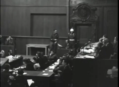 NUREMBERG, GERMANY - 1946: War Crimes Trials — Carved pediment and guarded door 库存影片 342920604