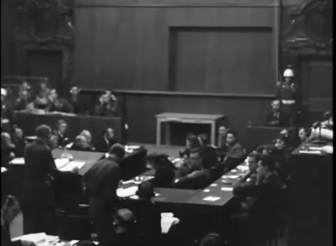 NUREMBERG, GERMANY - 1946: War Crimes Trials — Empty table on the court floor Видео 342920622