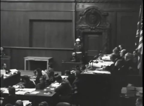NUREMBERG, GERMANY - 1946: War Crimes Trials — Carved crest and American flag Stock Footage 342920693