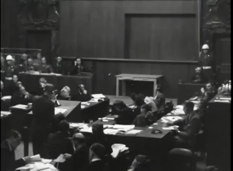 NUREMBERG, GERMANY - 1946: War Crimes Trials — Figures cross the open floor Видео 342920767