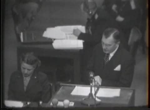 NUREMBERG, GERMANY - 1946: War Crimes Trials — Tight medium over the papers Видео 342920909