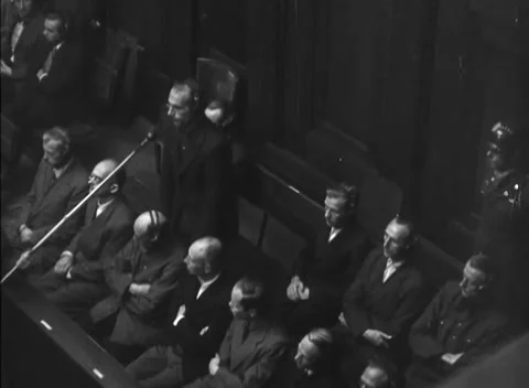 NUREMBERG, GERMANY - 1947: Arraignment — Boom microphone reaches into dock Vidéo 343320785