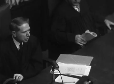 NUREMBERG, GERMANY - 1947: Arraignment — Open folder before judges stand Video stock 343320796