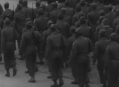 NUREMBERG, GERMANY - 1947: Dark parade view - Officers salute as colours pass Видео 344491297