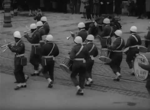 NUREMBERG, GERMANY - 1947: Drum section - Army band drummers cross the road Stock Footage 344491252