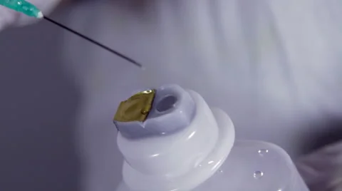 Nurs Hand Inserting Syringe Needle In a Medicine Bottle, Detail, Hospital Stock Footage 46001461