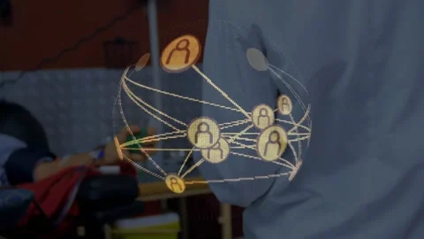 Nurse adjusting BP cuff while rotating network, instructing patient squeezing Video stock 320089792