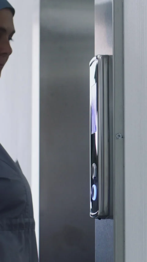 Nurse and elderly patient wait elevator Stock Footage 274900493