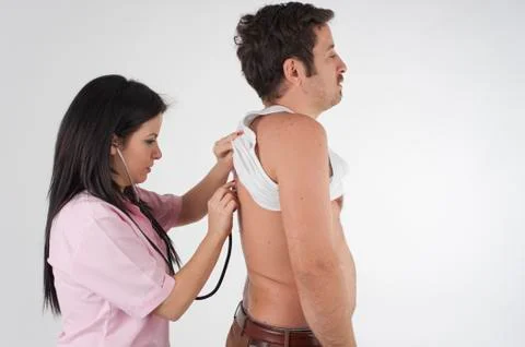 Nurse auscultation to a man Stock Photos