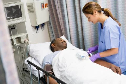 Nurse caring for patient Stock Photos